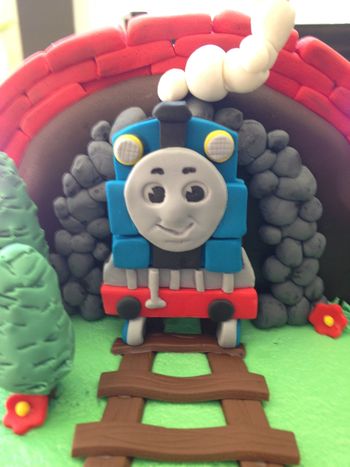 Thomas is made from Fondant, cut from a stencil.