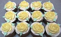Rosettes with cream cheese icing on banana cupcakes.