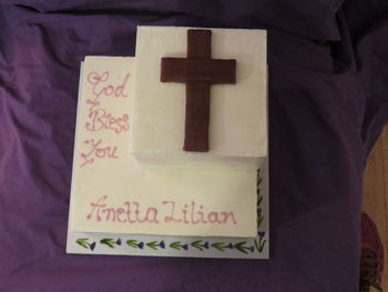 Rebaptism cake for my Grandma. SMBC with watercolour effect. Hand painted fondant board. 8inch and 5inch cakes. By far the scariest cake I have done so far. Here's to hoping my Grandma likes it :-)